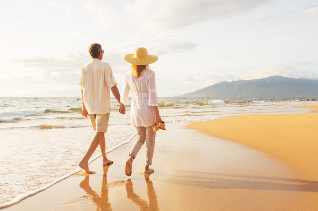 Couple Walking On Beach